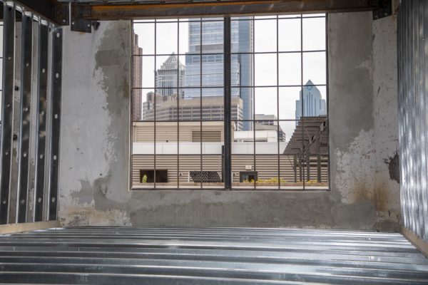Interior photo of 411 N 20th Street. After Premier Building Restoration completed concrete repairs and concrete patching to transform the building from an industrial to a residential use. It is an excellent example of adaptive reuse and Premier's expertise in project management.