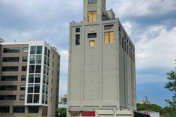 Exterior photo of 411 N 20th Street. Premier Building Restoration completed concrete repairs and concrete patching to restore the building's façade.