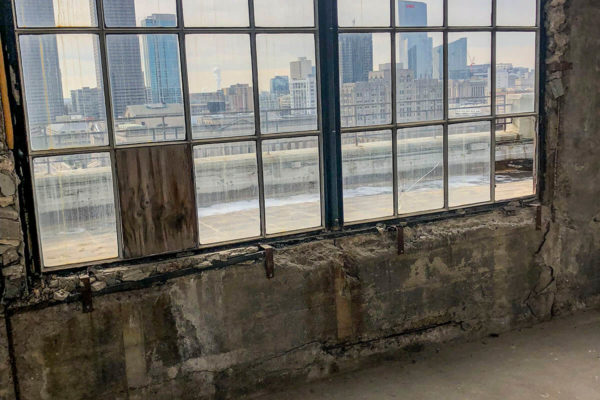 Interior photo of 411 N 20th Street. Before Premier Building Restoration completed concrete repairs and concrete patching to transform the building from an industrial to a residential use. It is an excellent example of adaptive reuse and Premier's expertise in project management.