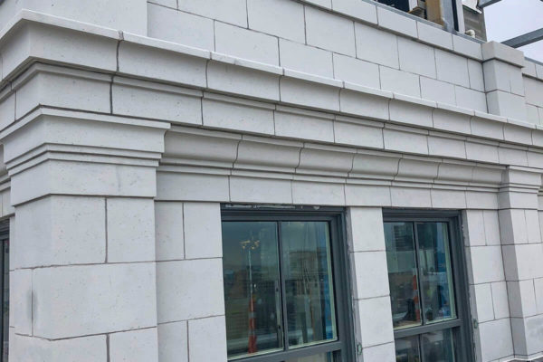 Photo of stone restoration done on the top floors of the historic Atlantic Building on South Broad Street, Philadelphia, PA.