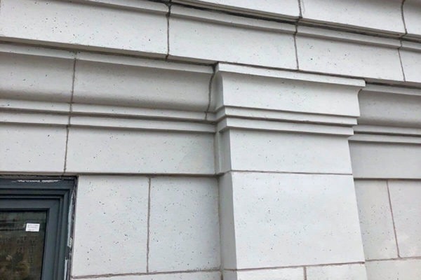 Photo of stone restoration done on the top floors of the historic Atlantic Building on South Broad Street, Philadelphia, PA.