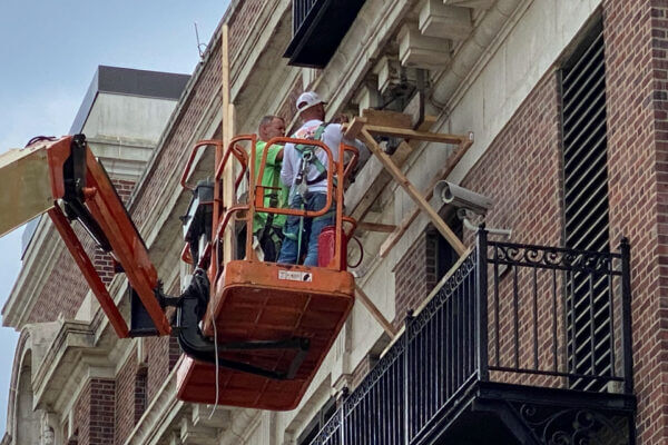 Premier Building Restoration workers perform structural stabilization in Philadelphia by installing a structural anchor system.
